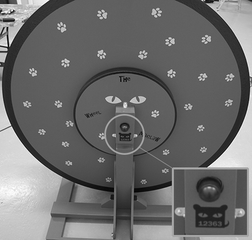 Rear view of a Maclaw Wheel with the serial-number label below the bearing circled and enlarged.
