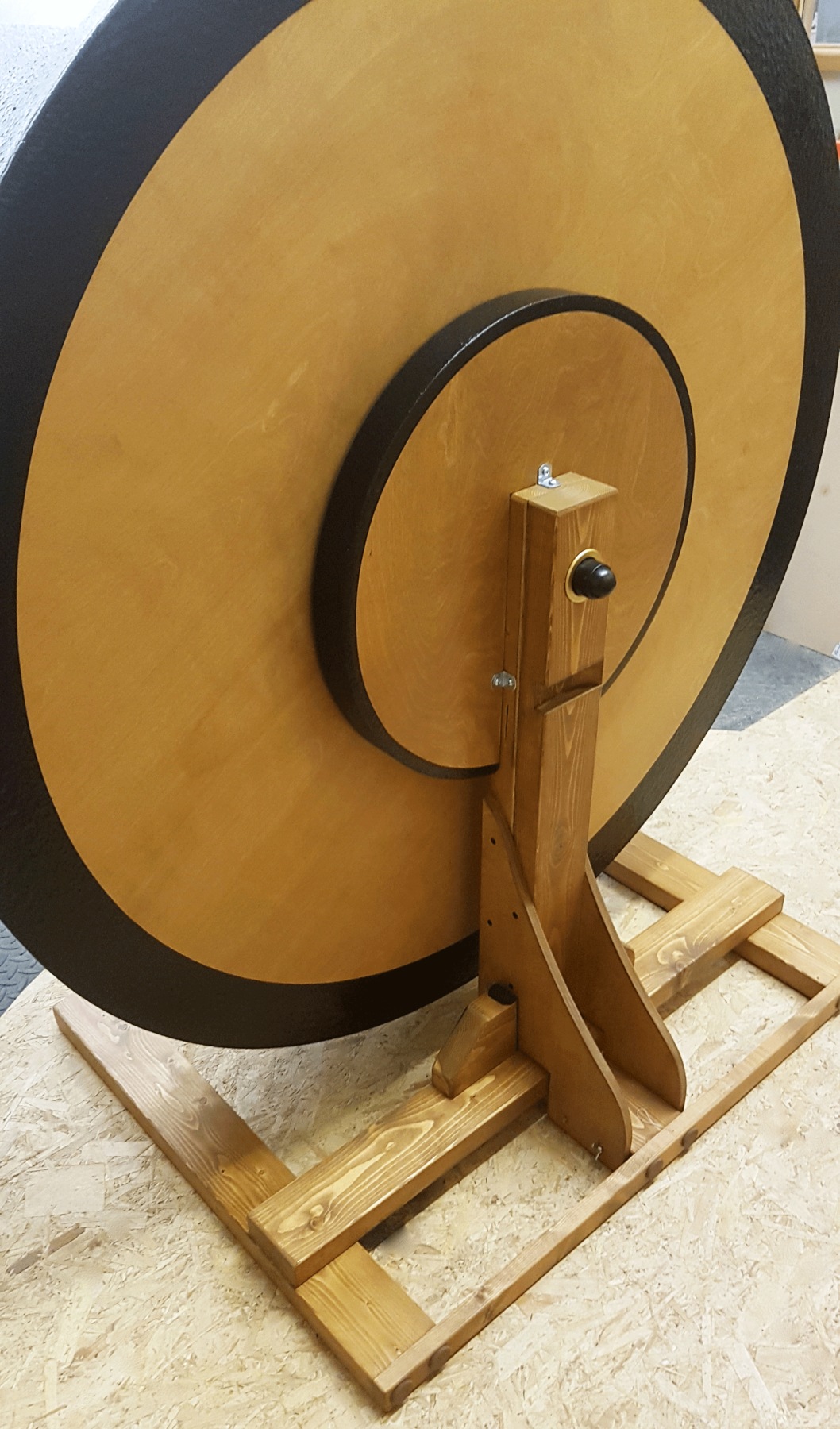 The natural timber back, upright and base of a handcrafted Maclaw Wheel